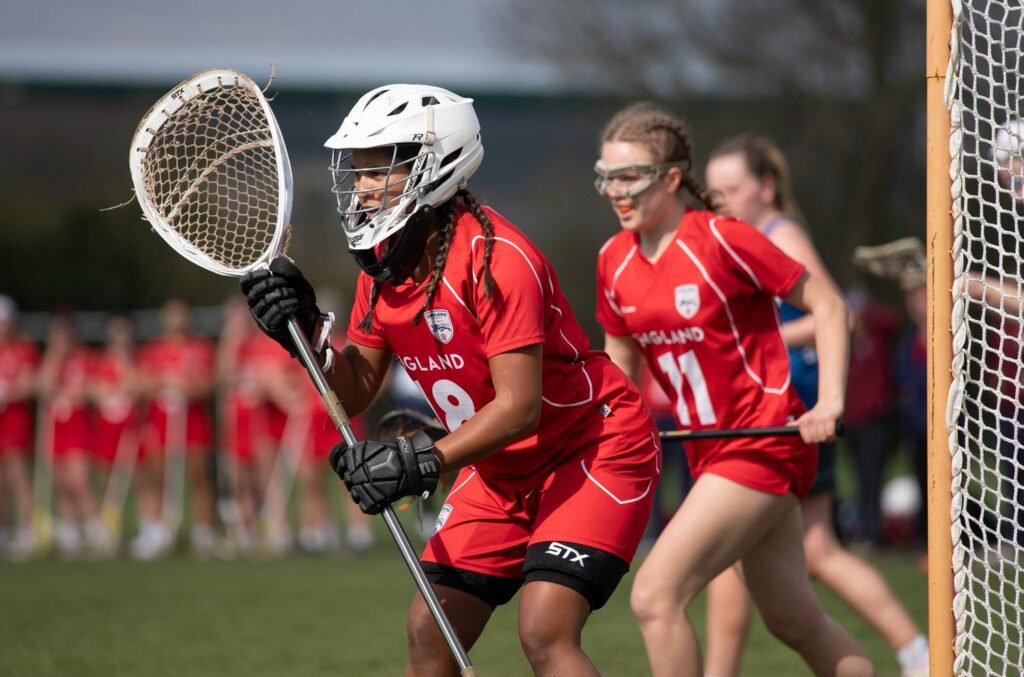 Action shot of Women's Lacrosse Team in defence