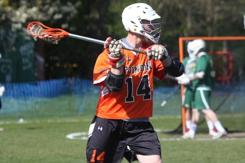 Action shot of individual for the English Mens Lacrosse